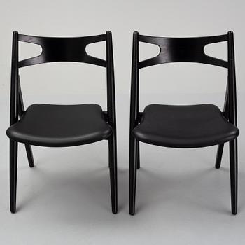 Hans J Wegner,  four 'CH29P Sawbuck' chairs, Carl Hansen, 2007.