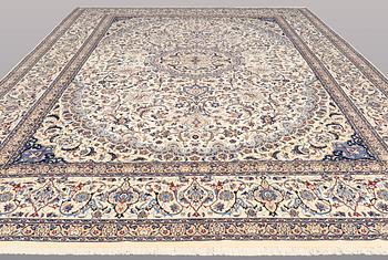 A CARPET, Nain part silk, s.k 9 LAA, 588 x 393 cm.