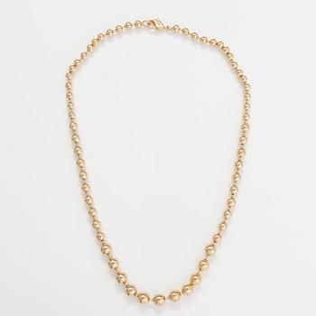 DIOR. A necklace and a pair of earrings in gold coloured metal. Marked Chr. Dior, Germany.