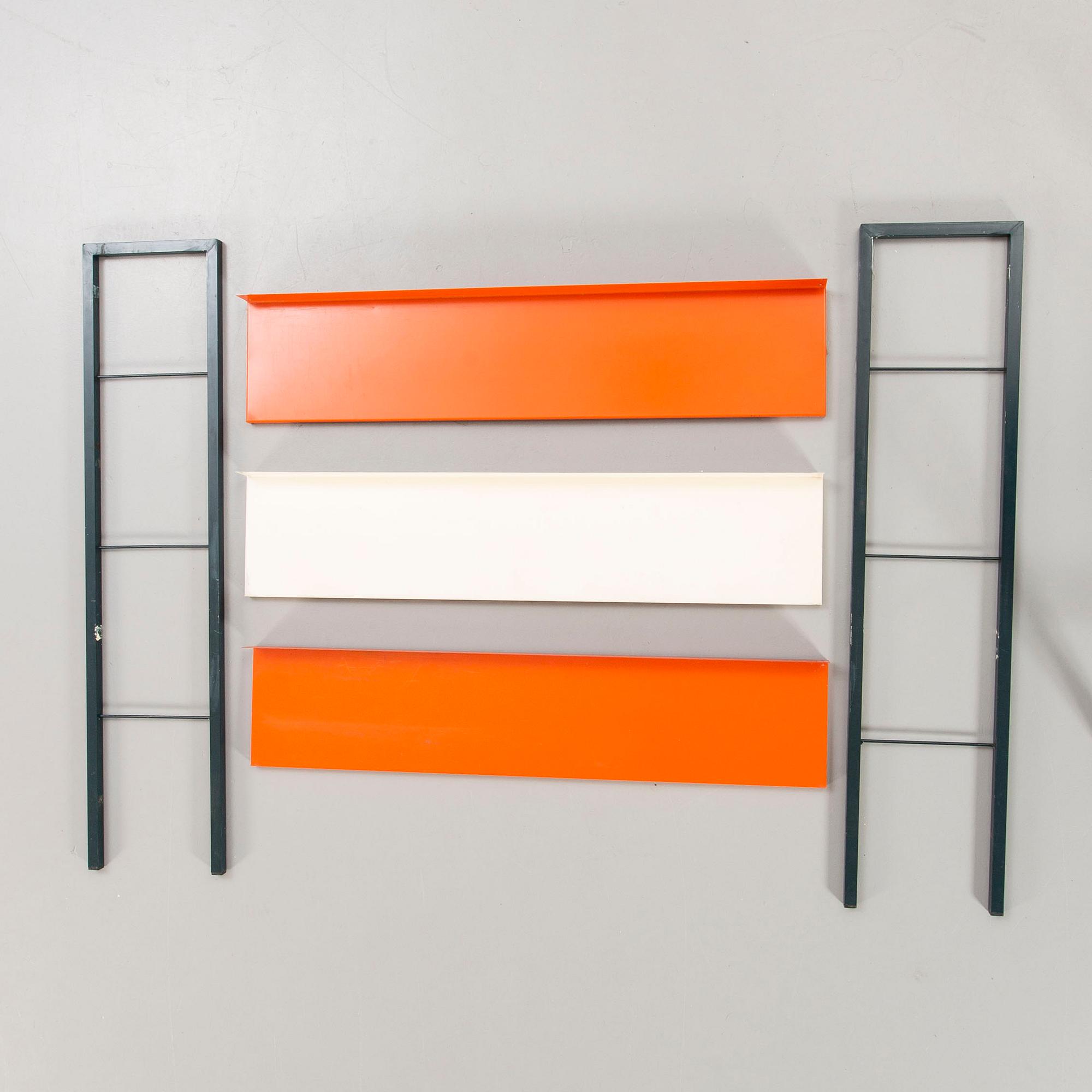 A 1950s  Adriaan Dekker lacquered metal book shelf for Tomato Holland.