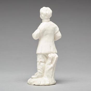 A Swedish Marieberg soft paste figure of a man with a bird, 18th Century.