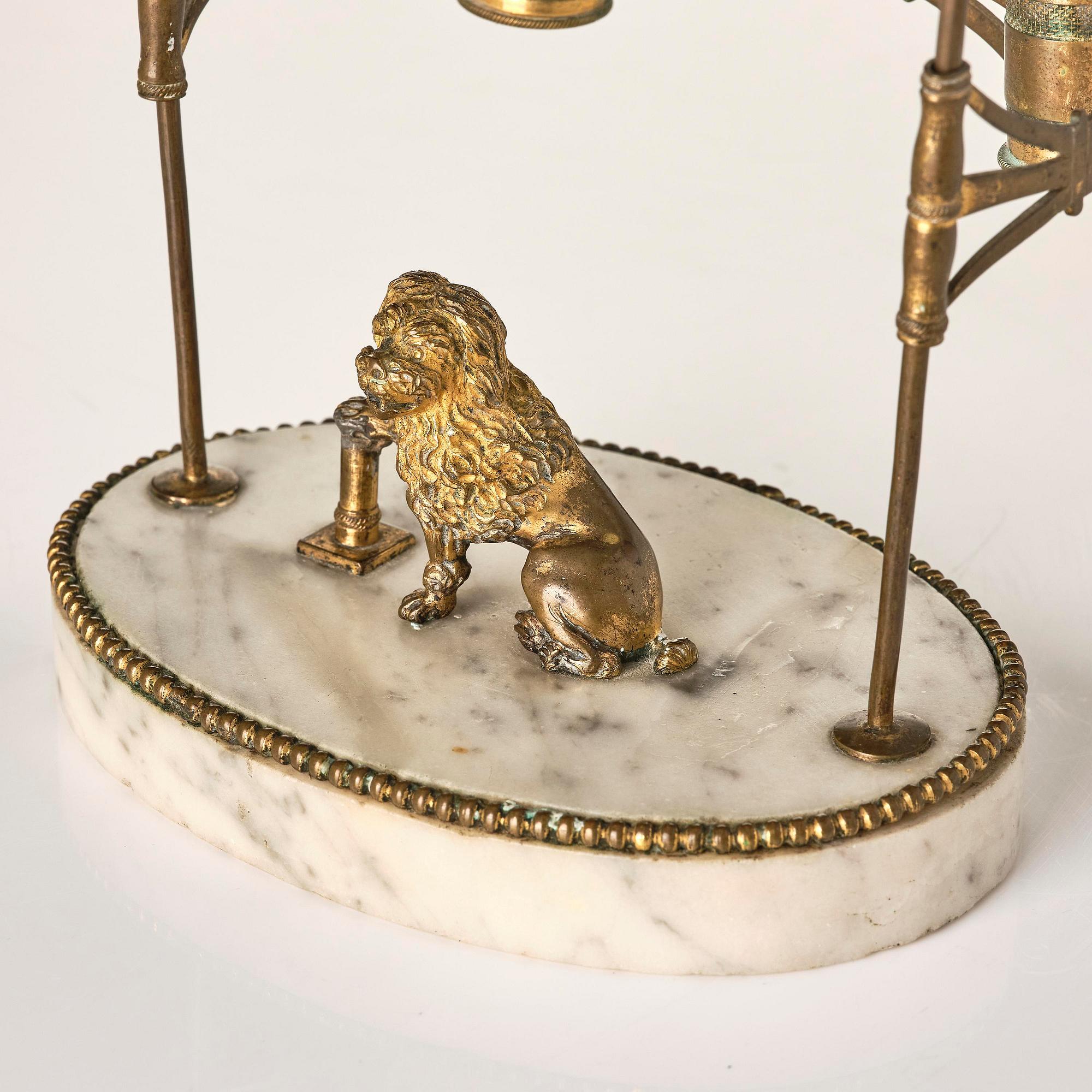 A late gustavian marble and gilt brass two-light reading lamp, late 18th century.