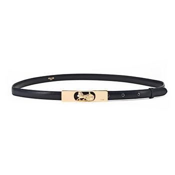 907. CÉLINE, a dark blue leather belt.