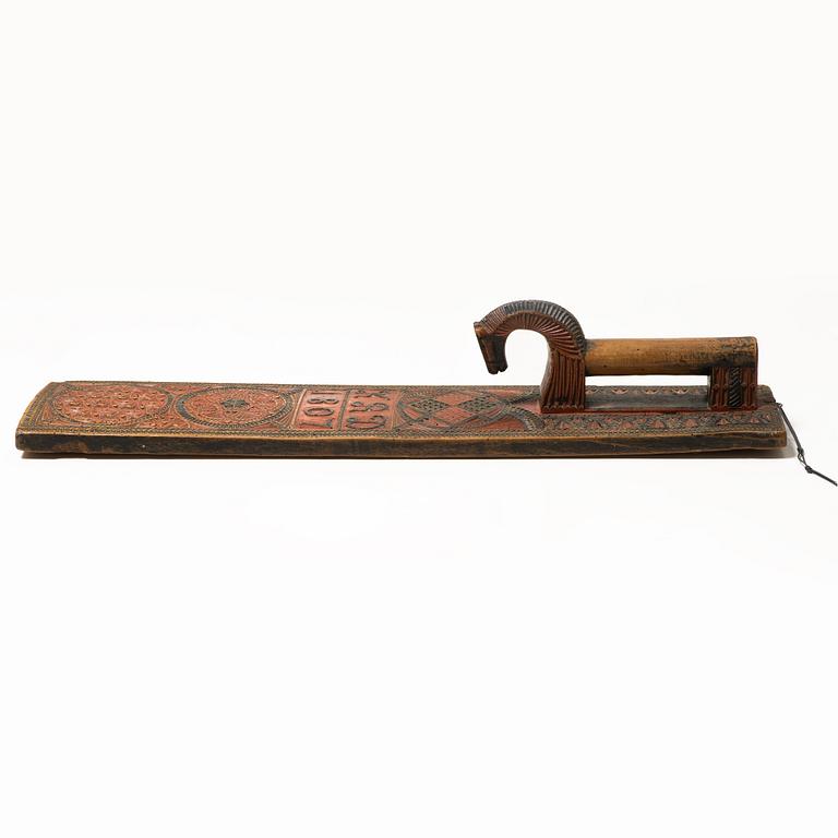 A painted wooden mangle board, Southern Sweden, dated 1807.
