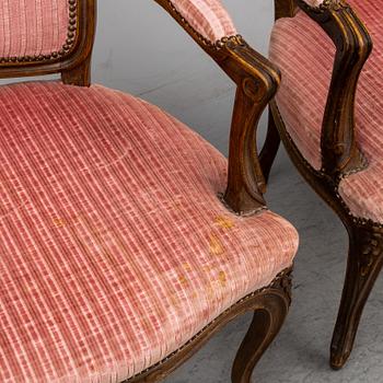 A pair of 19th-century rococo revival arm-chairs.