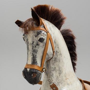 A circa 1900 rocking horse.