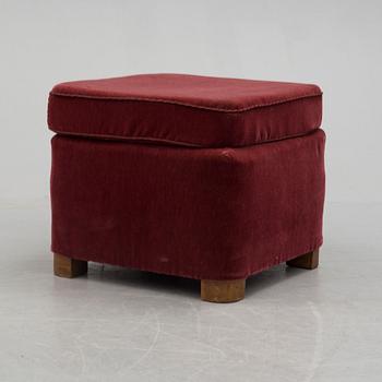 a foot stool from the first half of the 20th century.