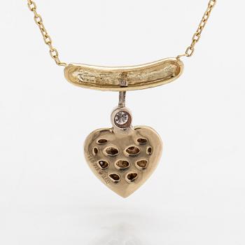A 14K gold necklace with diamonds ca. 0.08 ct in total.