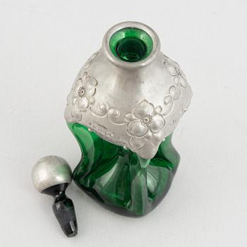 A green glass bottle with stopper, Sweden, early 20th century.