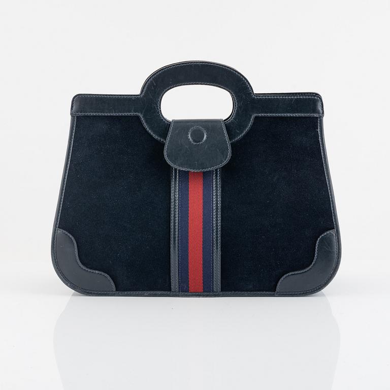 Gucci, a handbag.