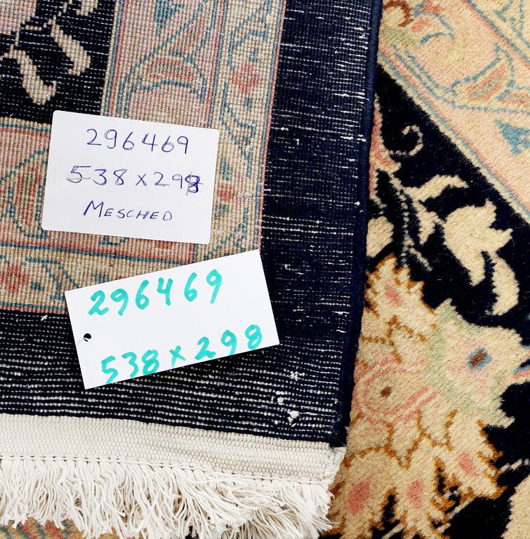 A Meshed carpet, c. 538 x 298 cm.