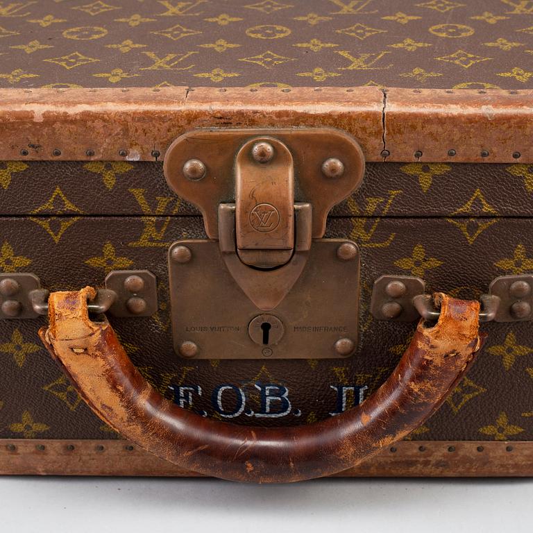 LOUIS VUITTON, a monogram canvas 'Le Loziné' suitcase.