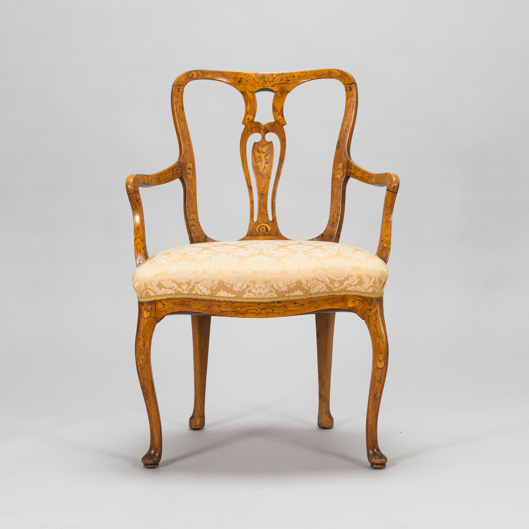 A Dutch 18th-century open armchair.