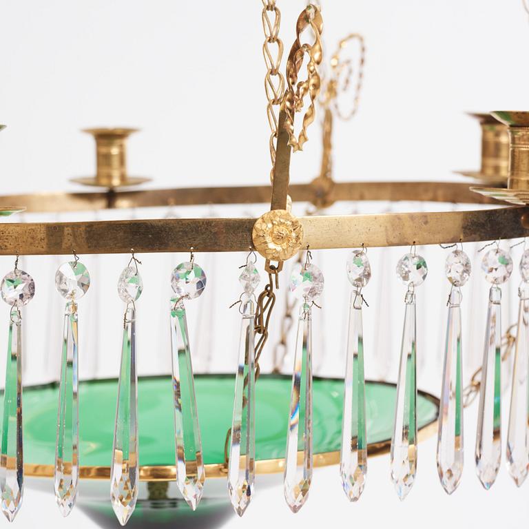 A late Gustavian gilt-brass and green glass six-light chandelier, late 18th century.
