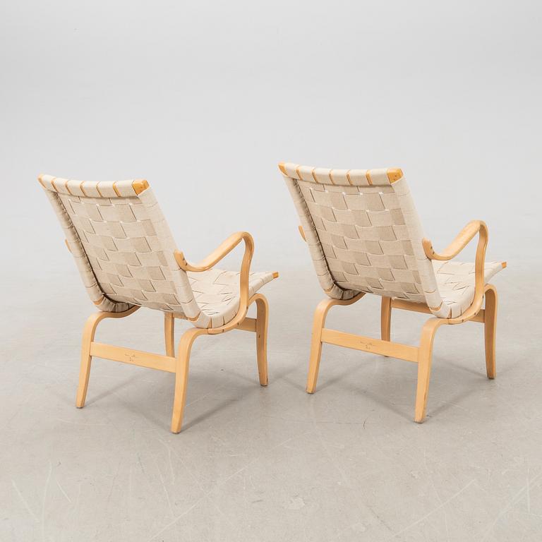 Bruno Mathsson, a pair of "Eva" armchairs for DUX, late 20th century.