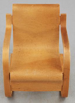 An Alvar Aalto birch armchair by O.y Huonekalu-ja Rakennustyötehdas A.B,