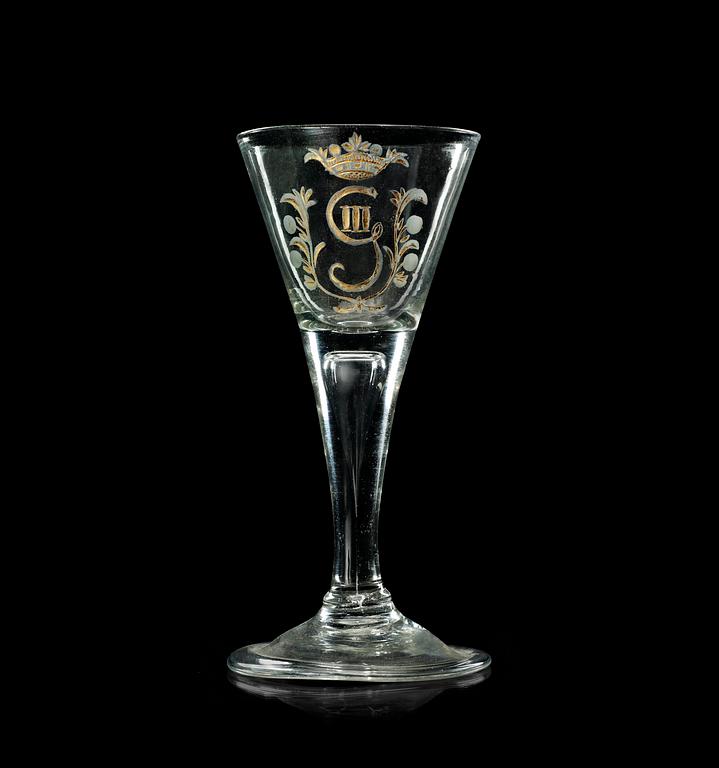 An engraved and gilt Swedish goblet, 18th Century with the monogram of King Gustavus III.