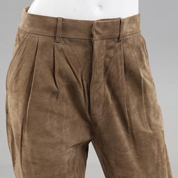 A pair of green suede pants by Ralph Lauren.