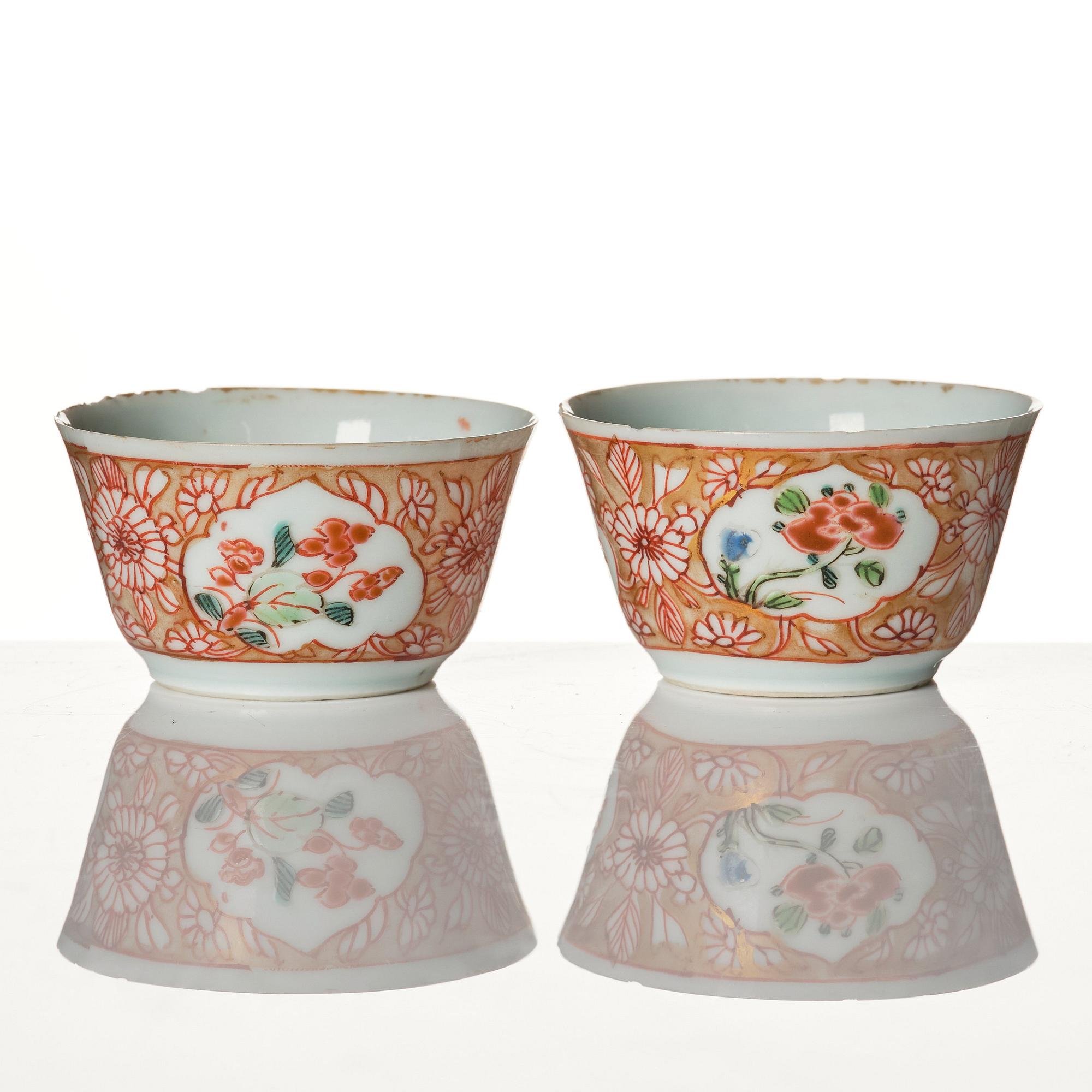 A pair of famille rose miniature cups with stands, Qing dynasty, 18th Century.