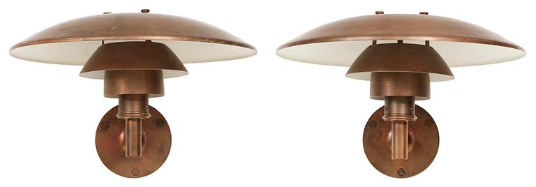 A pair of Poul Henningsen "model PH" wall lamps by Louis Poulsen, Denmark.