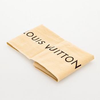 Louis Vuitton, a 'Selenga' clutch bag.