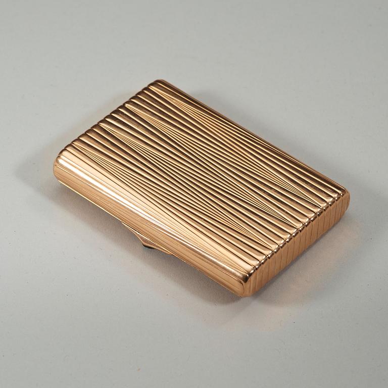 A Russian 20th century gold cigarette-case, unidentified makers mark, St. Petersburg 1908-1917.