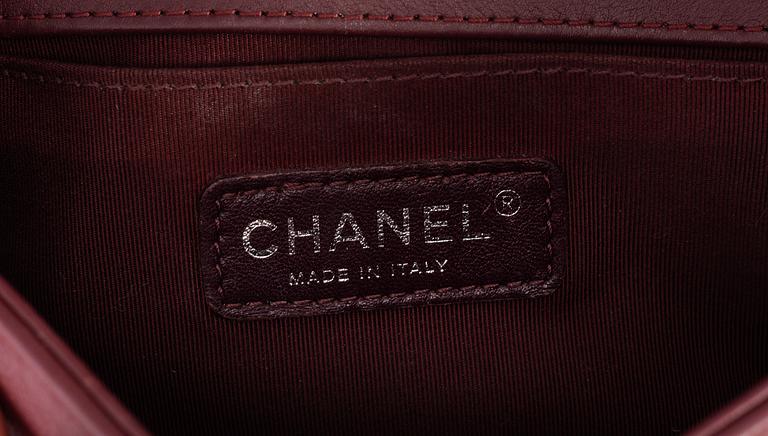 CHANEL, a burgundy quilted velvet 'Small Boy Bag'.