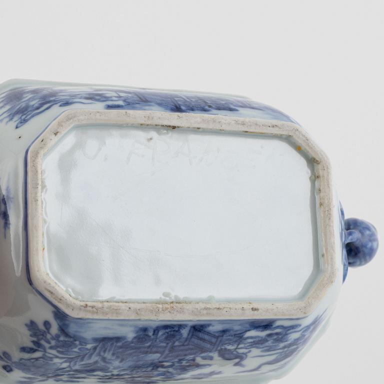 A small Chinese export tureen with cover, two cups, a saucer and a jug with cover, Qing dynasty, 18th century.