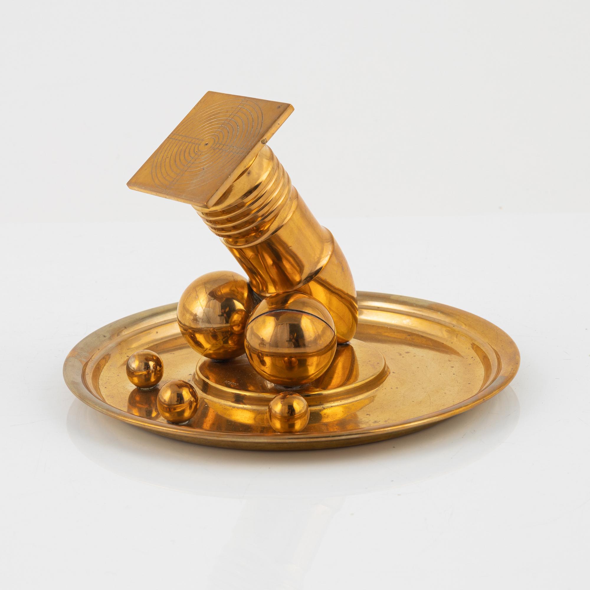 A four-piece brass writing set, Gusum, 20th century.