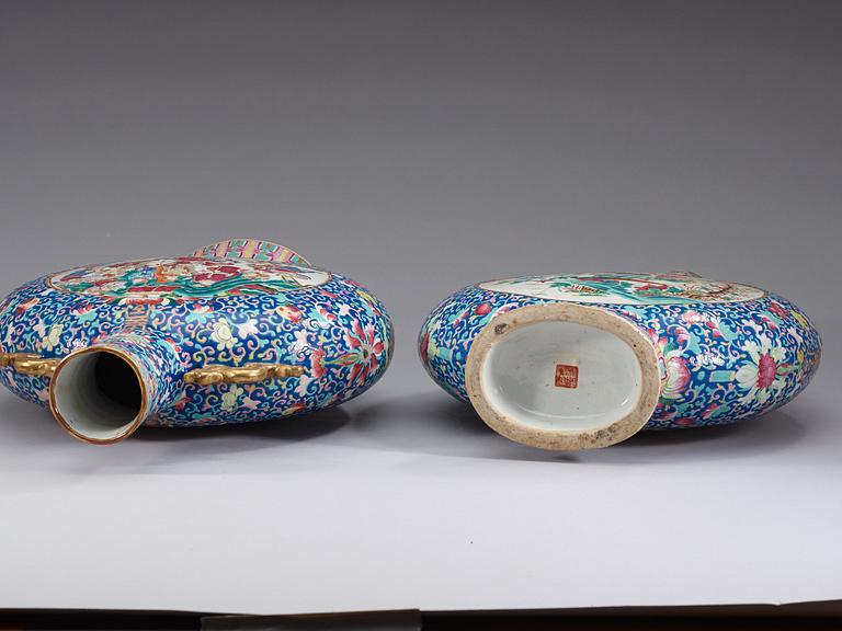 A pair of large famille rose moon flasks, Qing dynasty, 19th Century.
