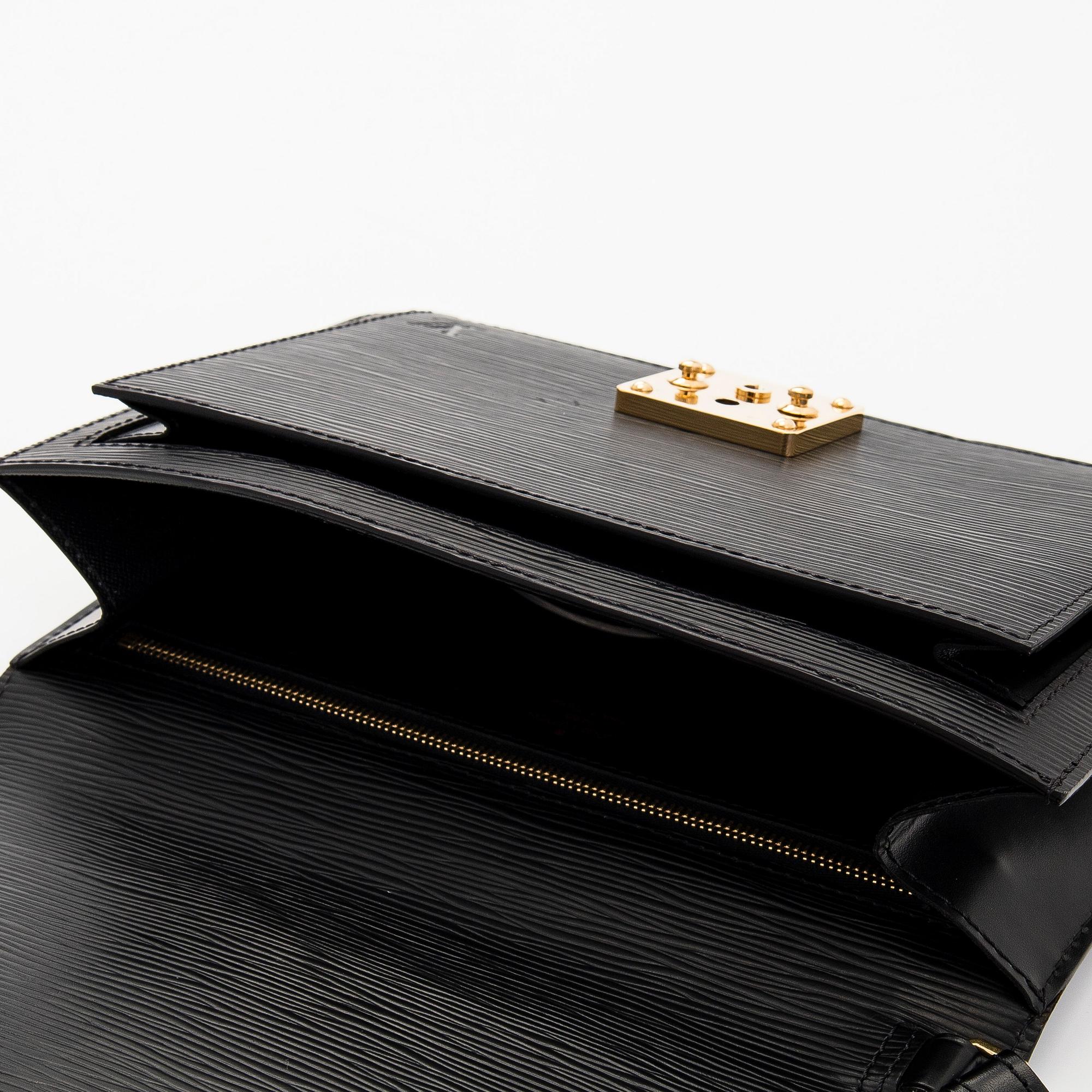 Louis Vuitton, laukku/clutch, ”Sellier Dragonne”.