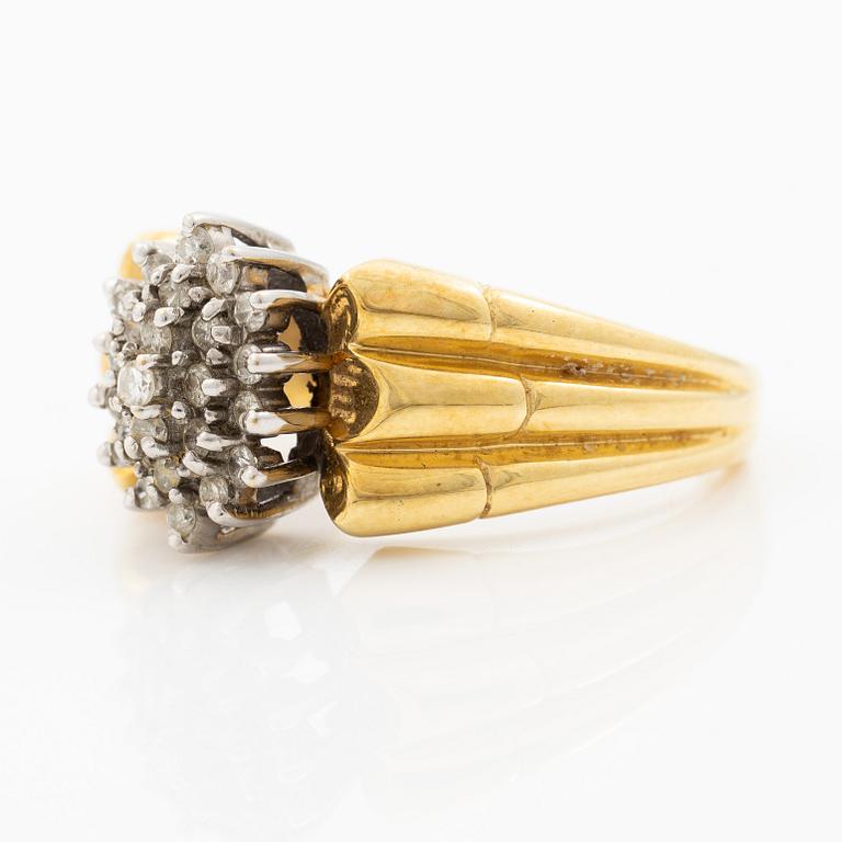 18K gold ring with diamonds.