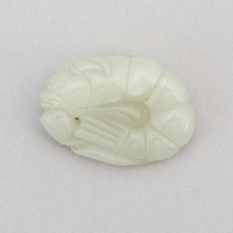 A Chinese nephrite figure in the shape of a shrimp, presumably around the year 1900.