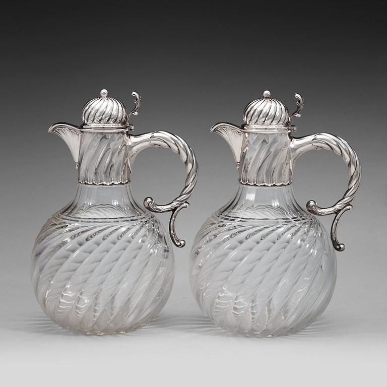 A pair of Swedish 19th century silver and glas jugs, marks of K. Andersson, Stockholm 1893.