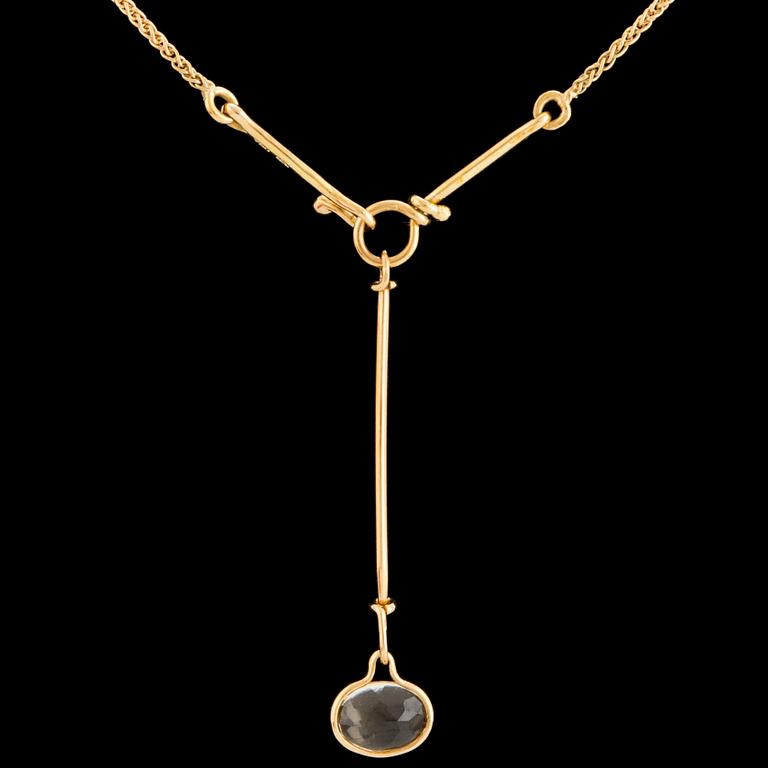 A 'Savannah' pendant set with a faceted citrine by Vivianna Torun Bülow Hübe for Georg Jensen, designed 2006.