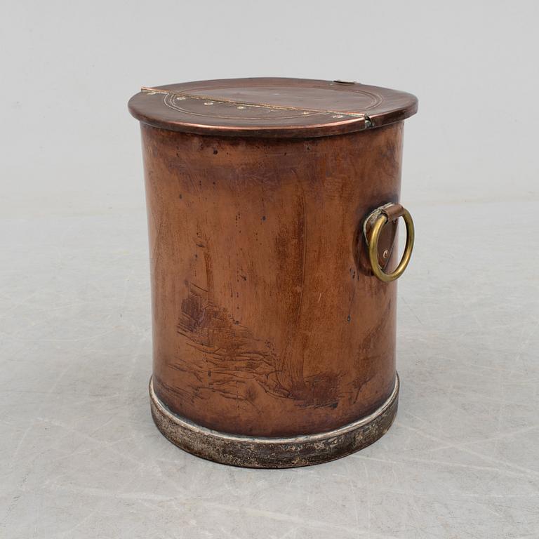 A copper water container, around the year 1900.