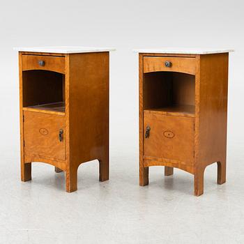 A pair of early 20th century bedside tables.