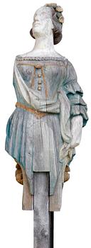 115. A WOODEN FEMALE FIGURE HEAD,