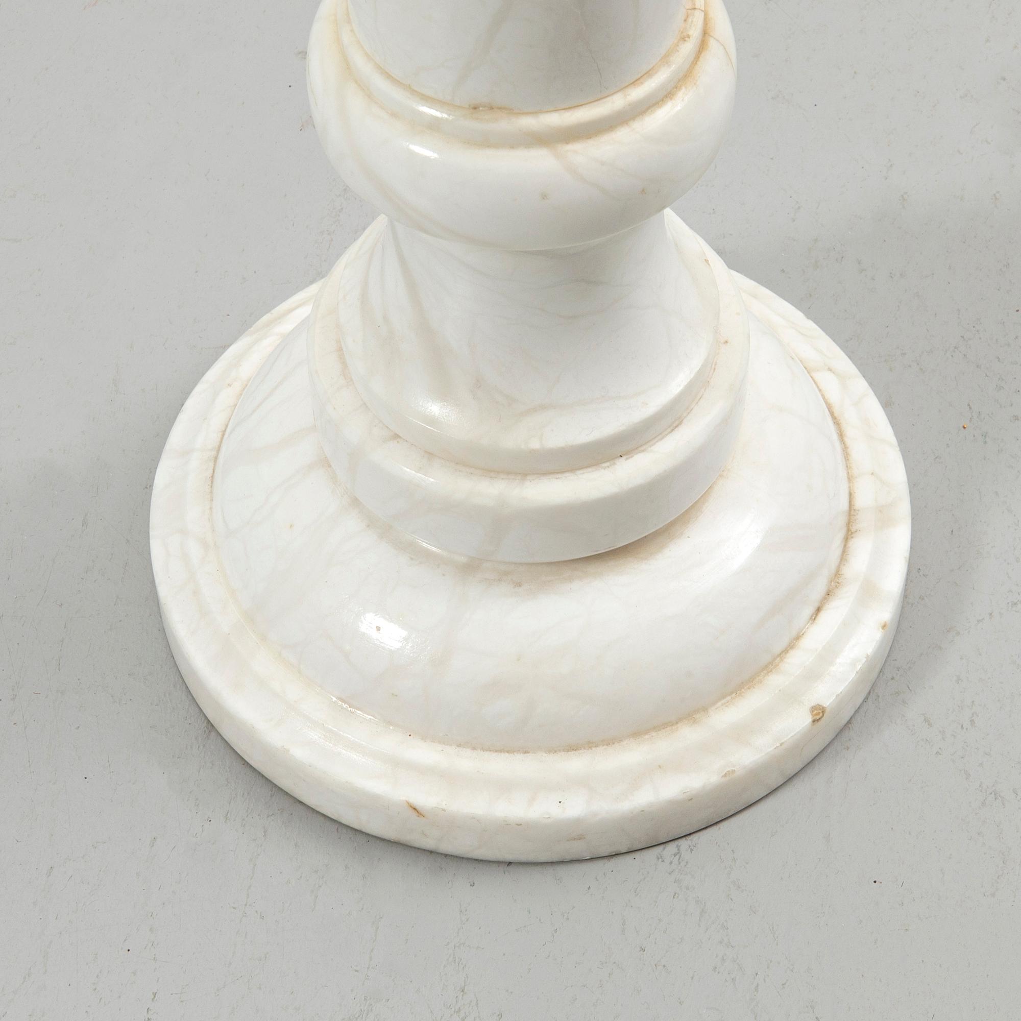 Pedestal with urn, 20th century.