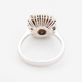 Princess-cut colour treated fancy deep brown-yellow diamond ring.