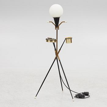 A 1950's floor lamp with ashtray and cigarette holder, Stilnovo.