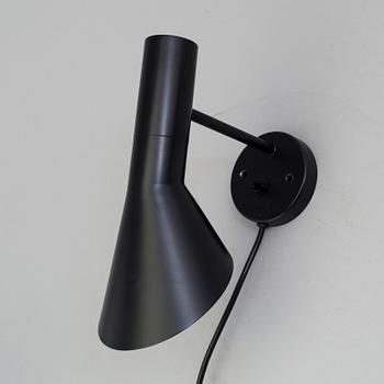 ARNE JACOBSEN, a "AJ" wall light, Louis Poulsen.