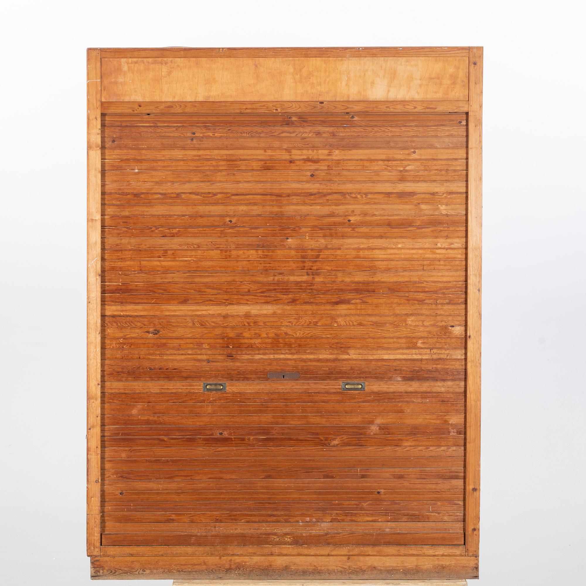 a roll top cabinet, mid 20th century.