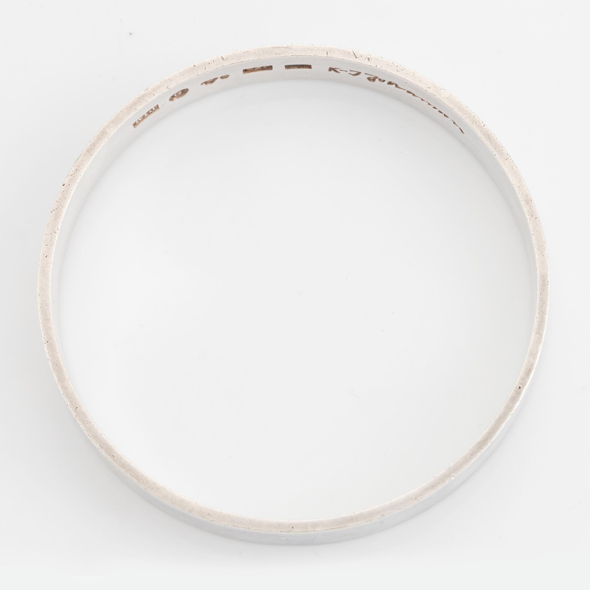 Karl-Ingemar Johansson a silver bracelet.