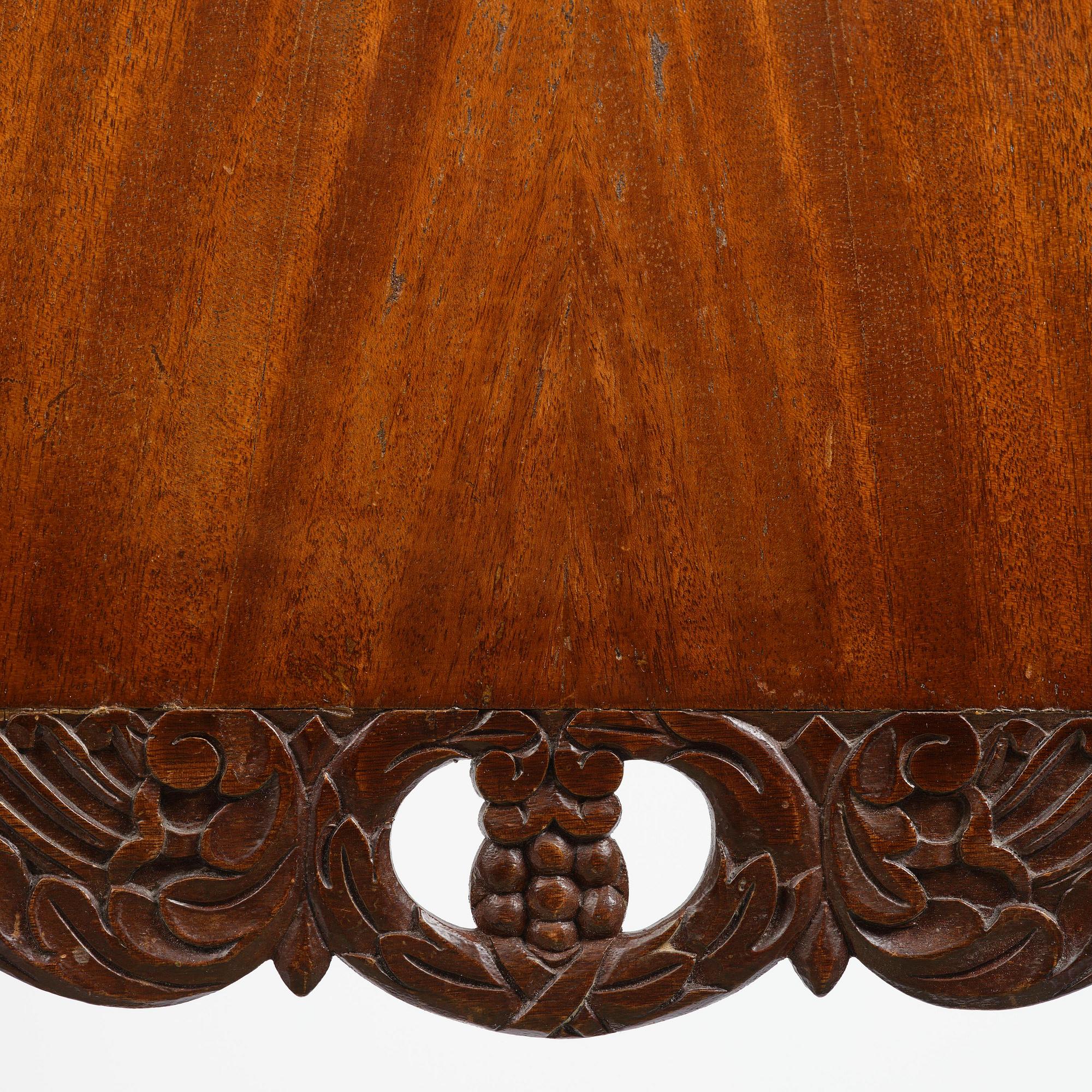 A pair of Baltic / Russian mahogany Empire armchairs, first part 19th century.