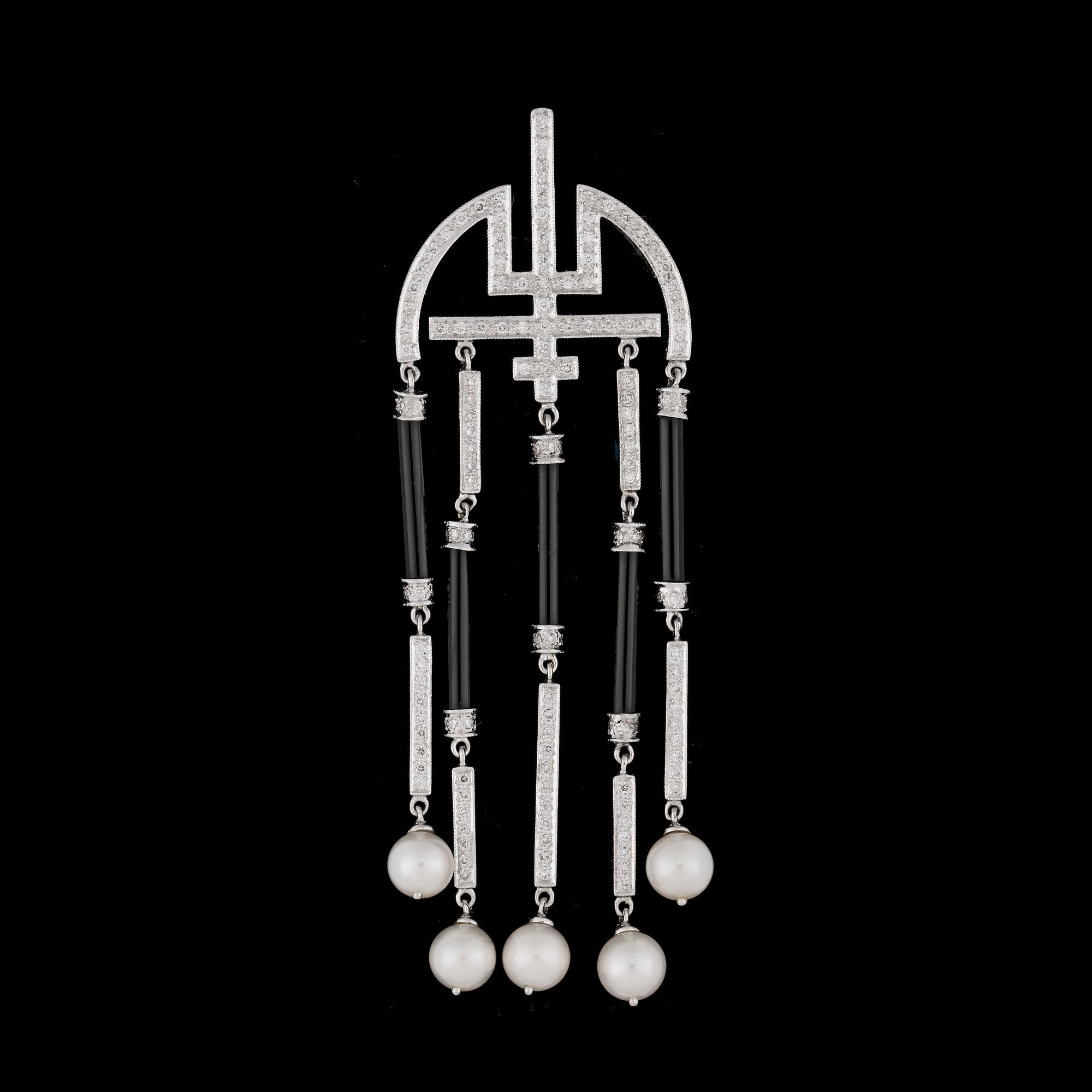 An onyx, cultured pearl and brillinat cut diamond pendant, total carat weight circa 2.06 cts.