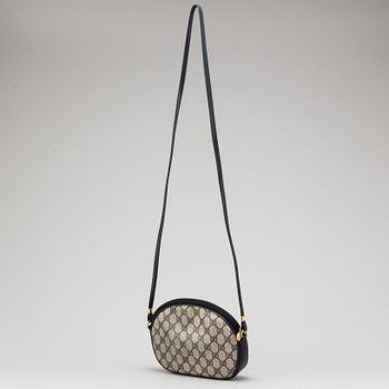 a 1980's Gucci bag and purse.