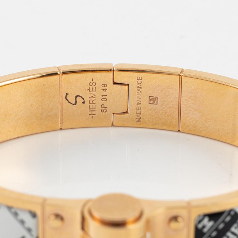 Hermès, a hinged enamel bracelet.