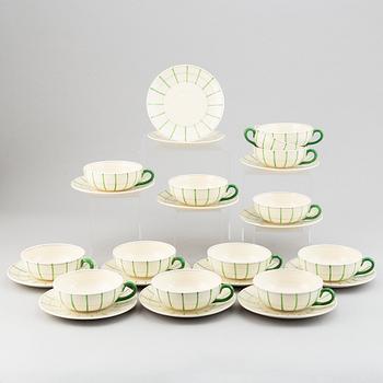 Wilhelm Kåge, a 13-piece porcelain 'Spaljé' tea service, mid 20th Century.