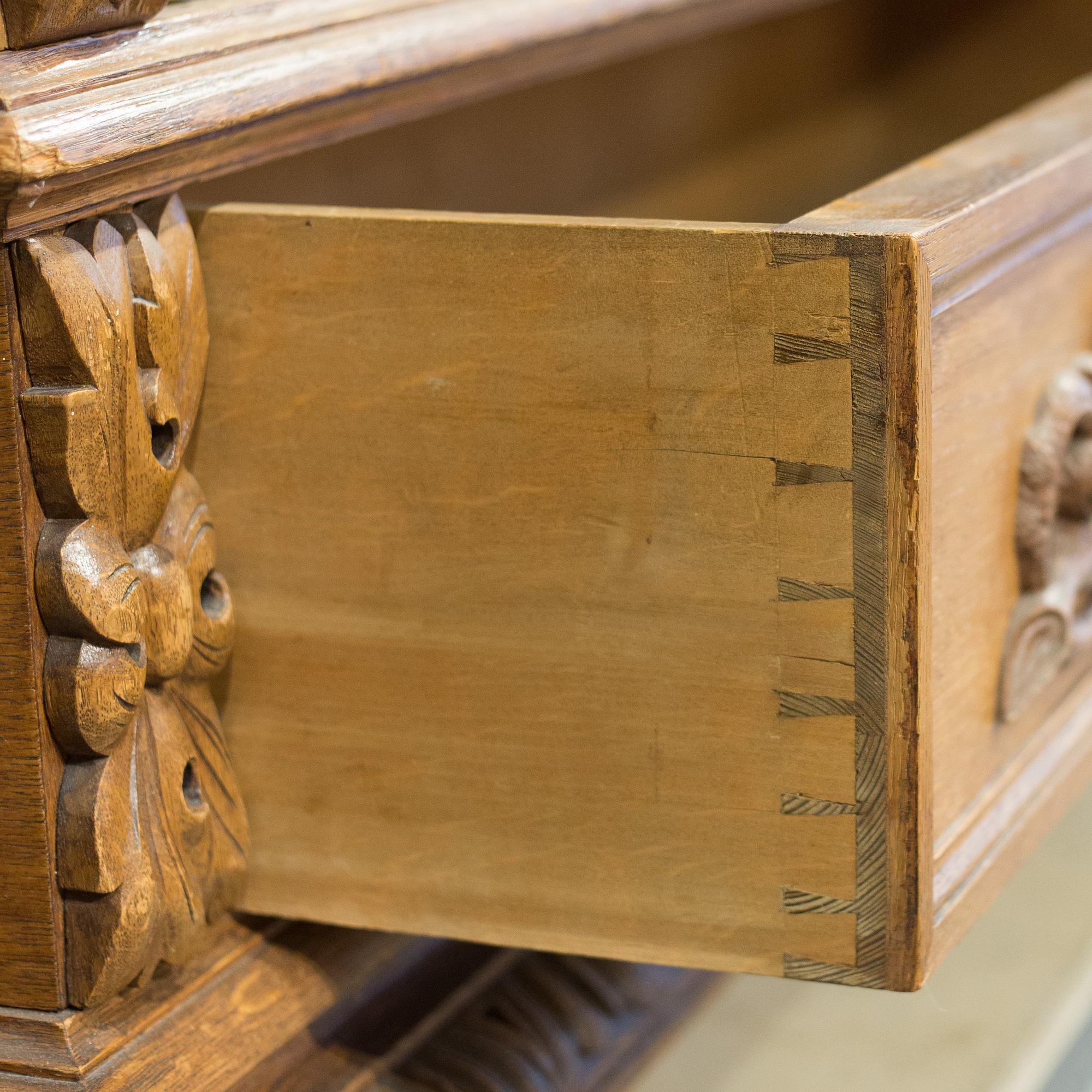 a oak vitrine cabinet from the late 1800's.